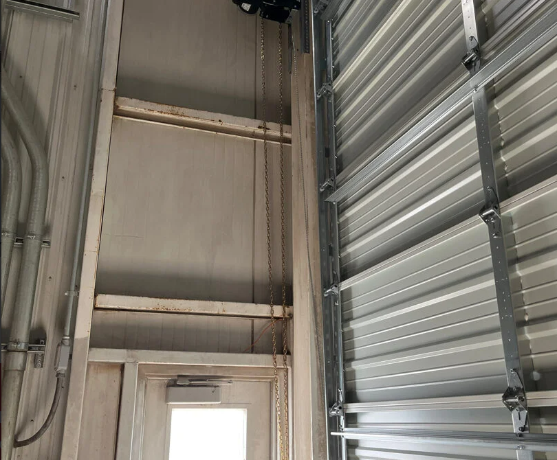 Technician Performing Garage Door Opener Repair Service in Granville, Ohio