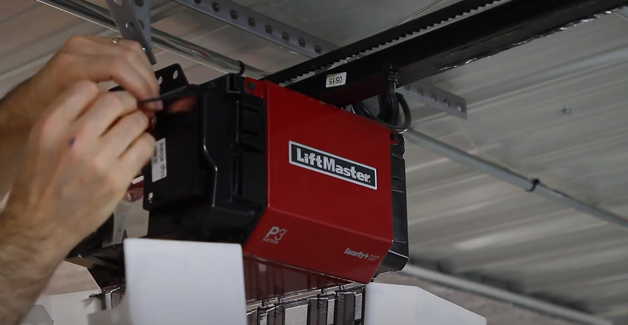 Technician performing garage door opener repair in Granville, Ohio for improved functionality and safety